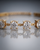 Gold-Plated 925 Silver Solitaire Station Bangle | Multi-Stone CZ Cuff Bracelet